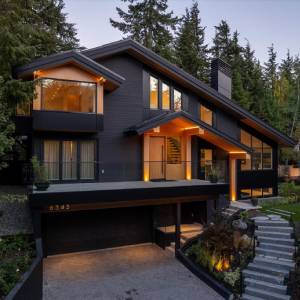 Whistler front yard landscape with stone paver driveway and stone steps