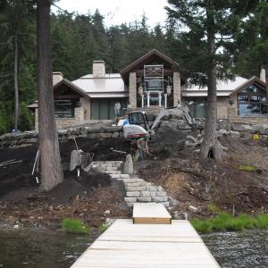 Whistler mini excavator digging for a new residential landscape