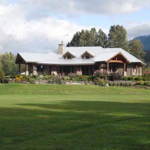 Pemberton residential landscape with stonework, lawn and garden beds