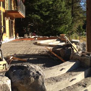 Concrete forms for a curved lakeside patio and steps