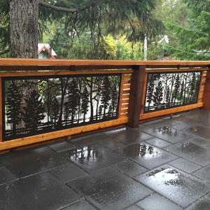 Decorative exterior cedar railing with custom carpentry details
