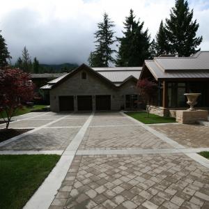 Home entrance with paving stone walkway and front step detail