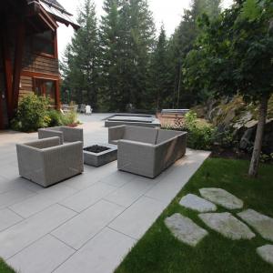 Paving stone patio with patterned pavers creating an outdoor seating area